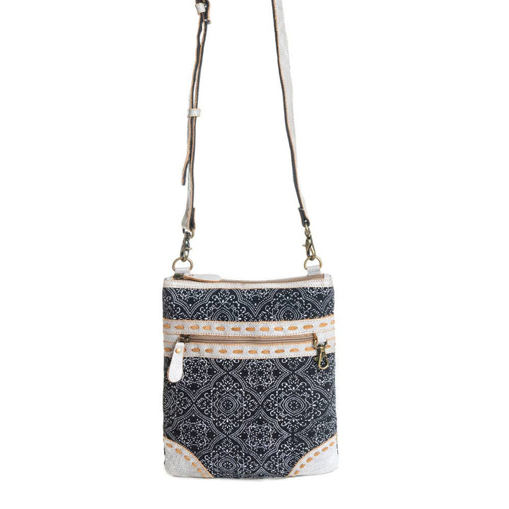 Myra Moroccan Nights small crossbody bag with geometric print - Close-Up of Leather and Canvas Detail