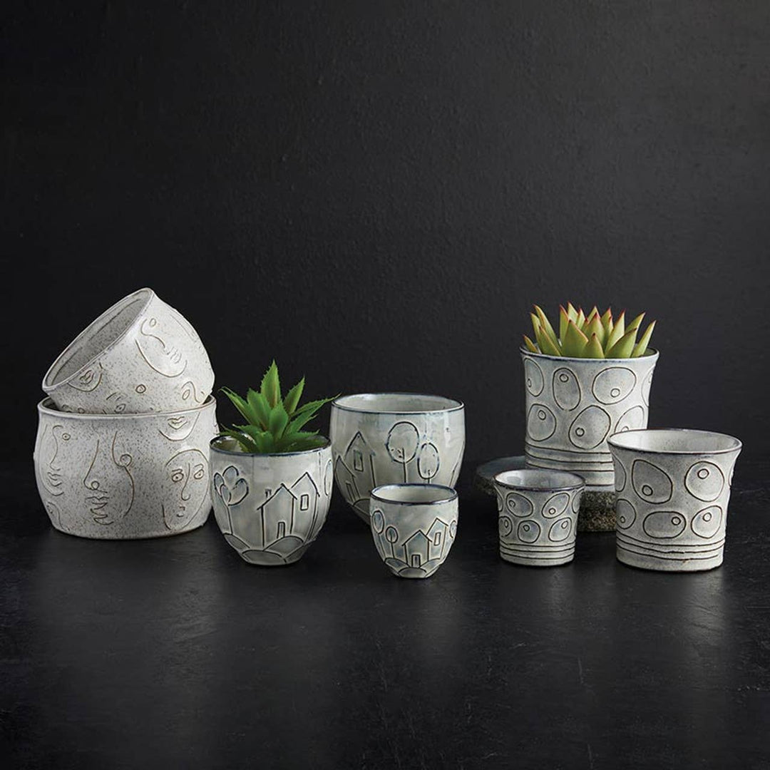 47th & Main - Abstract Face Pot1