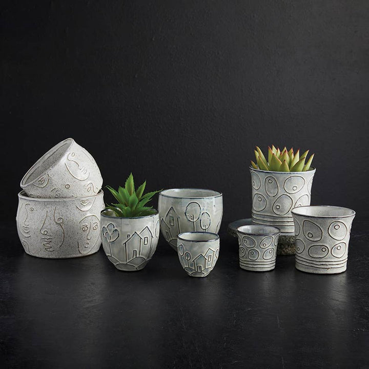 47th & Main - Abstract Face Pot1