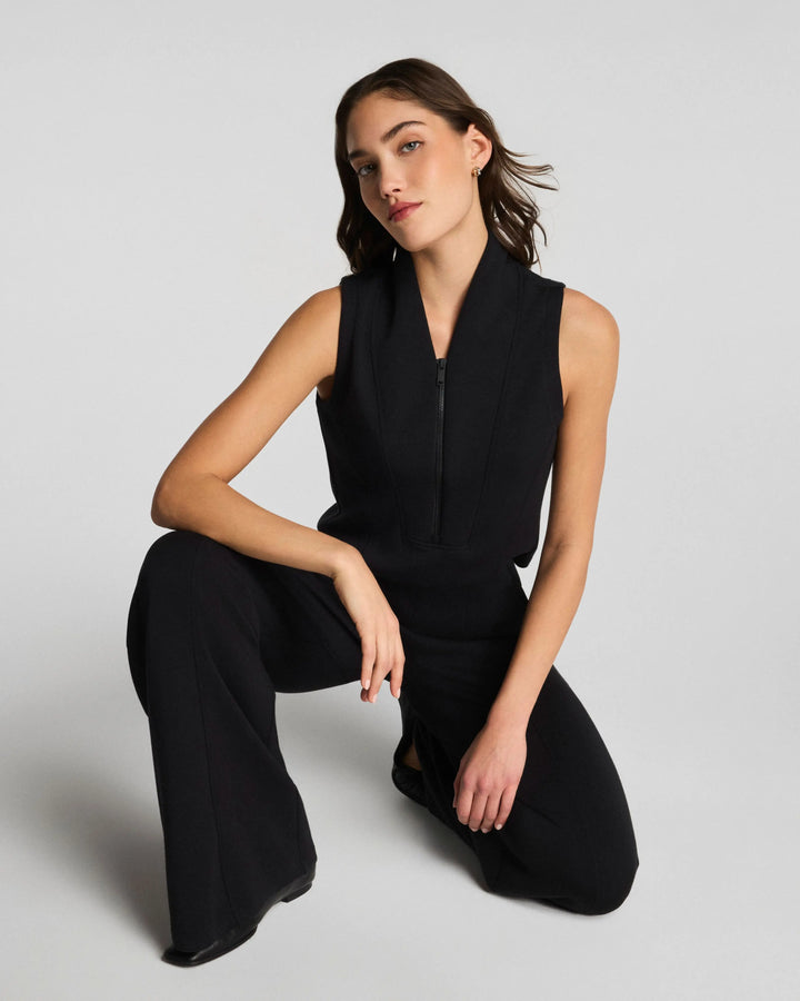 Spanx AirEssentials Shawl Collar Half Zip Jumpsuit - Very Black crouched